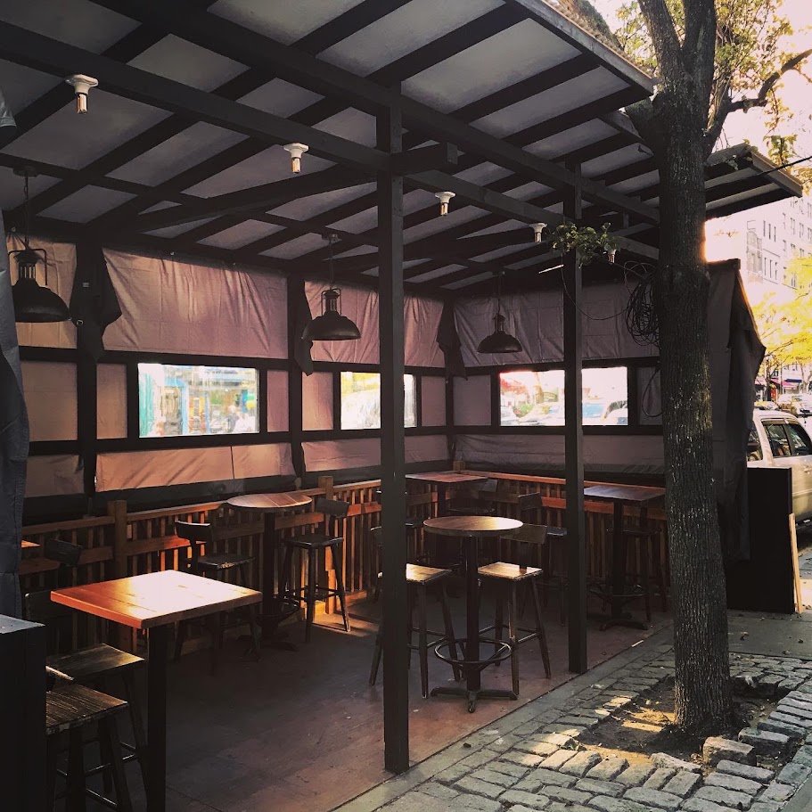 Modern Japanese restaurant with a long bar.
